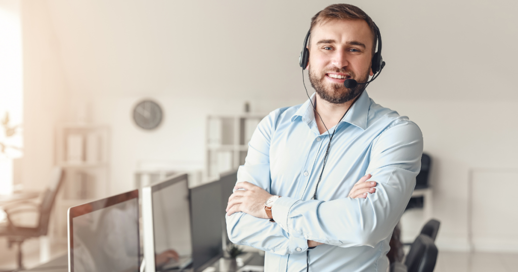 Remote and hybrid work increase the importance of IT services, man standing with his headset in home office
