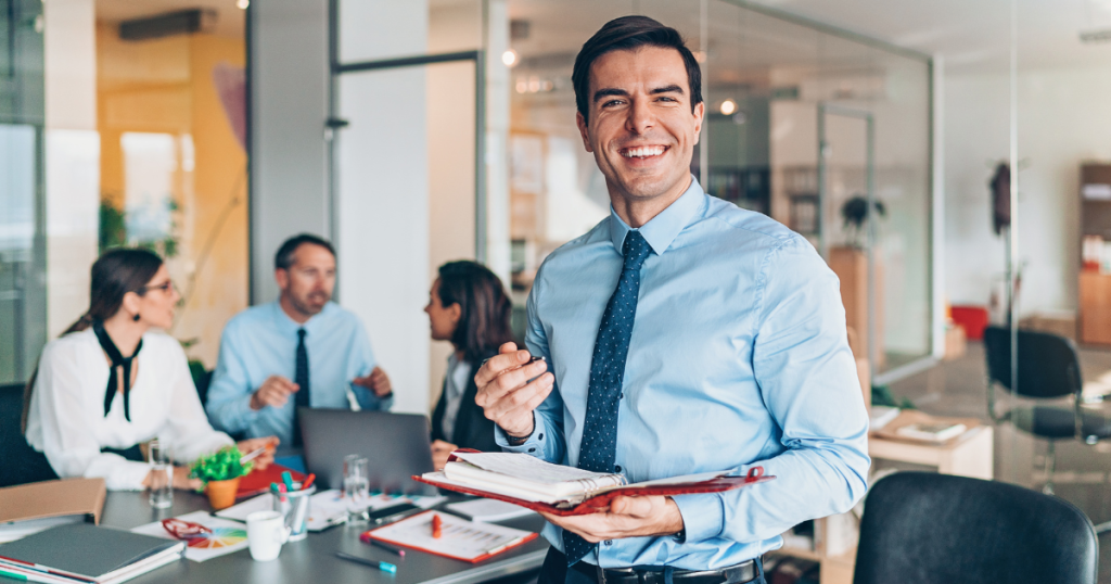 FinTech business leader planning future managed IT services strategy in modern office environment